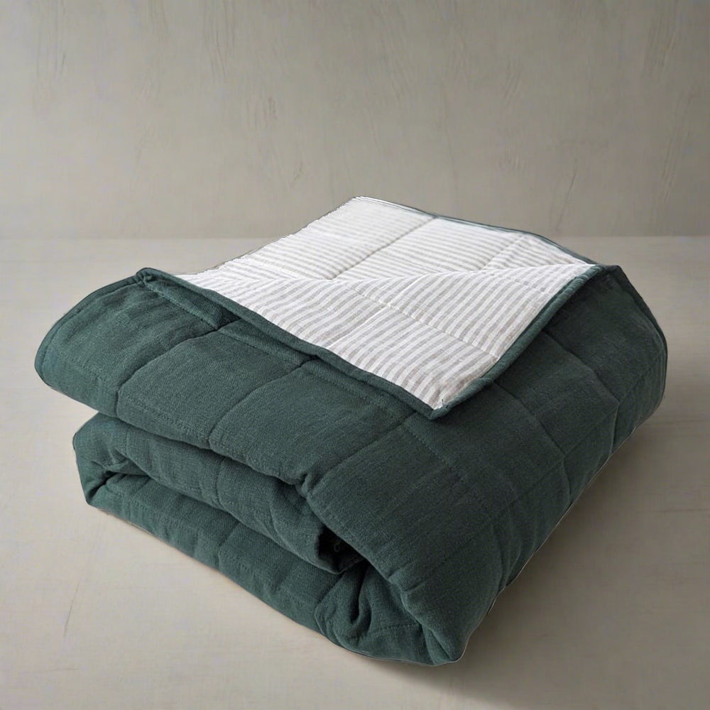 Soft breathable lightweight minky blanket linen blanket for king bed designer bedding Close-up of a textured green blanket with a striped pattern #color_forest-green-stripe