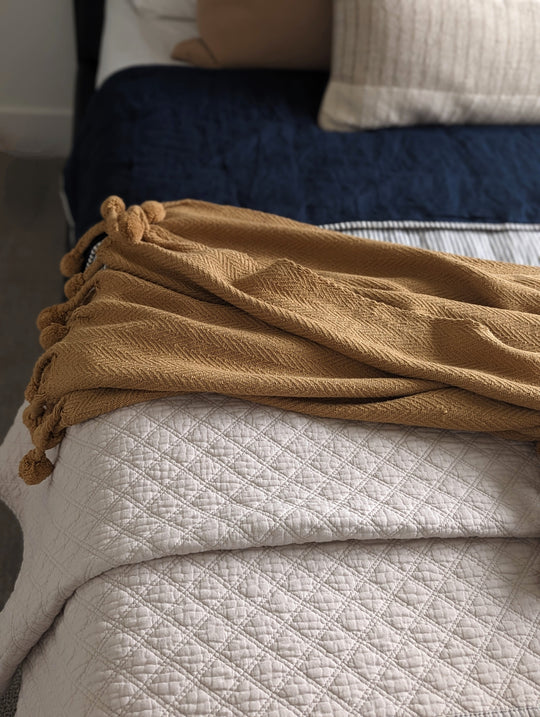 European stonewashed linen quilts, made from 100% linen, offer durability, breathability, and a timeless aesthetic for any bedroom# color_navy-stripe