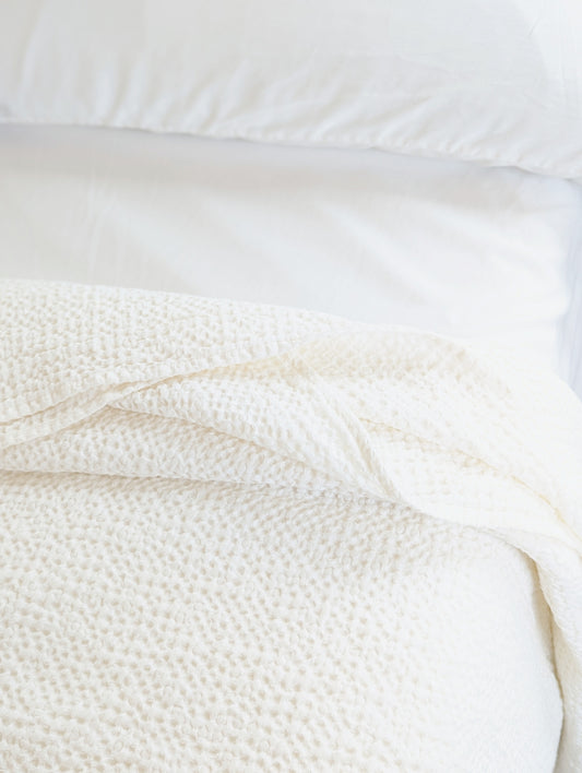 Luxurious waffle throw blankets for bed make of linen #color_white