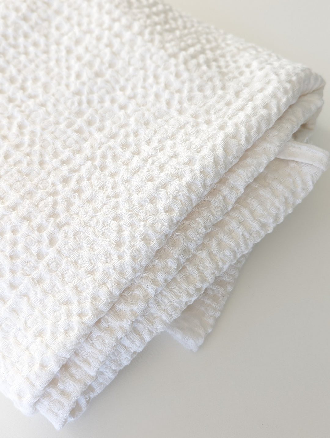 Luxurious waffle throw blankets for bed make of linen #color_white